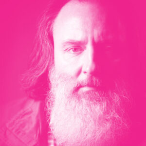 Alexander Lazar's headshot with a hot pink filter.