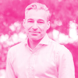 Allan Matheson's headshot with a hot pink filter.