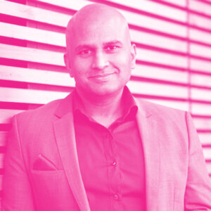 Alok Kulkarni's headshot with a hot pink filter.