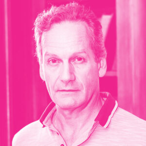 Antony Acciarri's headshot with a hot pink filter.