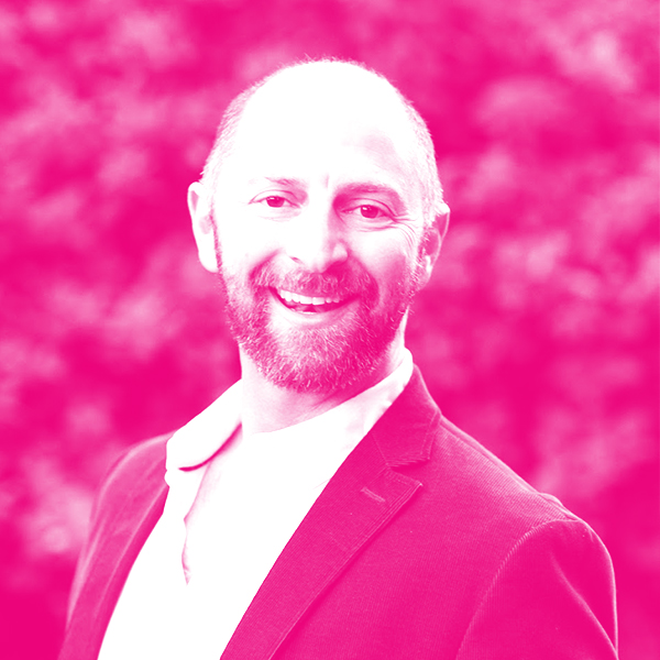 Barney Pell's headshot with a hot pink filter.