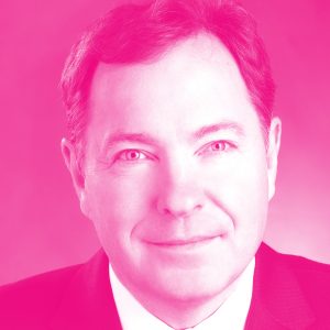 Brent Norton's headshot with a hot pink filter.