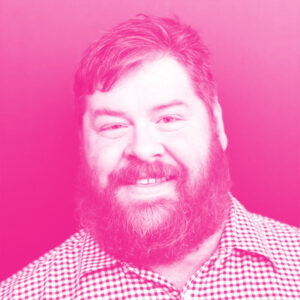 Brian Martin's headshot with a hot pink filter.
