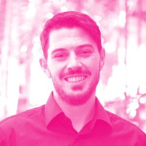 Chris Neumann head shot with hot pink filter