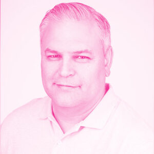 Cristian Chavez's headshot with a hot pink filter.