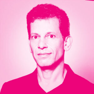 David Rowan's headshot with a hot pink filter.
