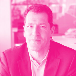 Gregoire Berry's headshot with a hot pink filter.