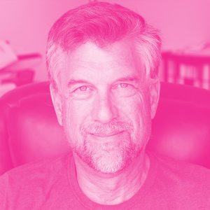 Jim Horowitz's headshot with a hot pink filter.
