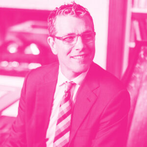 Henry Albrecht's headshot with a hot pink filter.