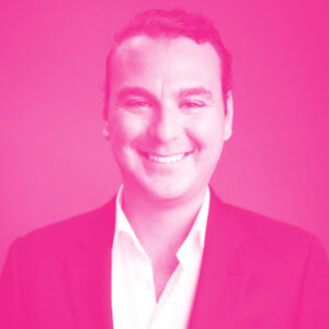 Jason Kosec's headshot with a hot pink filter