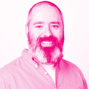 Matt Cooper's headshot with a hot pink filter.