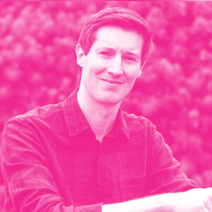 Matthew Bedrossian's headshot with a hot pink filter.