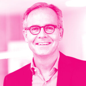 Michael Bucheit's headshot with a hot pink filter.