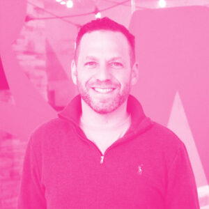 Neil Grunberg headshot with hot pink filter