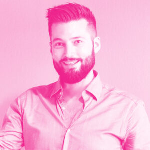 Nicholas Nadeau's headshot with a hot pink filter.