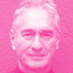 Ron Dembo's headshot with a hot pink filter.