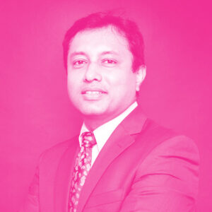 Shirish Srivastava's headshot with a hot pink filter.