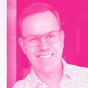 Stephen Leonard's headshot with a hot pink filter.