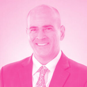 Thomas Weist's headshot with a hot pink filter.