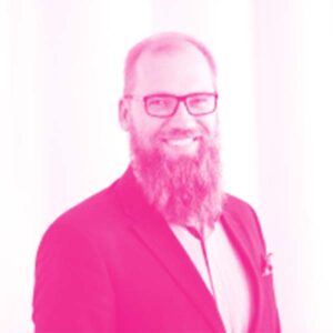 Tõnu Esko's headshot with a hot pink filter.