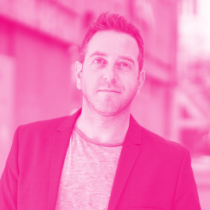 Brian Mosoff's headshot with a hot pink filter.