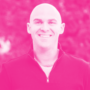 Jamie Rosenblatt's headshot with a hot pink filter.