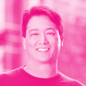 Jay Reinemann's headshot with a hot pink filter.