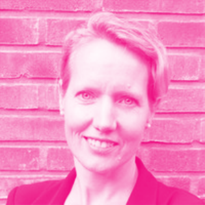 Rhiannon Davies&#039; headshot with a hot pink filter.